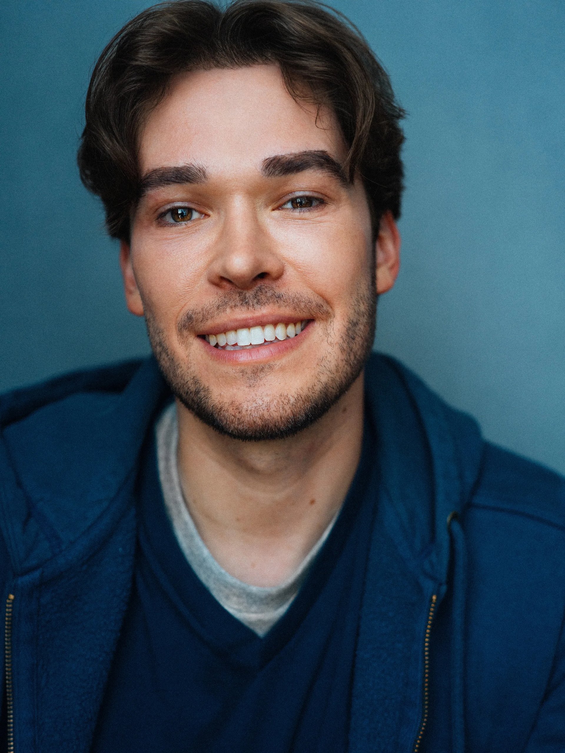 Austin Hammer - Warm Smile in Blue Hoodie